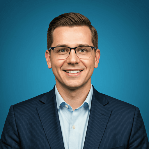 Example of a strong LinkedIn profile photo: a well-lit headshot against a plain background, face filling most of the frame, with a natural expression and direct eye contact